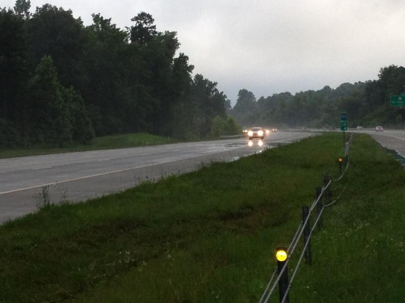 Patch of water that I hit....you can see how far onto the other side of the highway my Z tracked, while the wired guard rail saved my life/car....