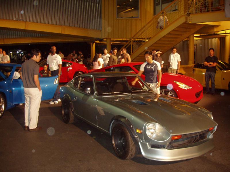 This silver Gen I Z is owned by Randy Rodriguez, who designed the 370Z exterior.  That's Randy standing next to the drivers door in the Puma t-shirt.